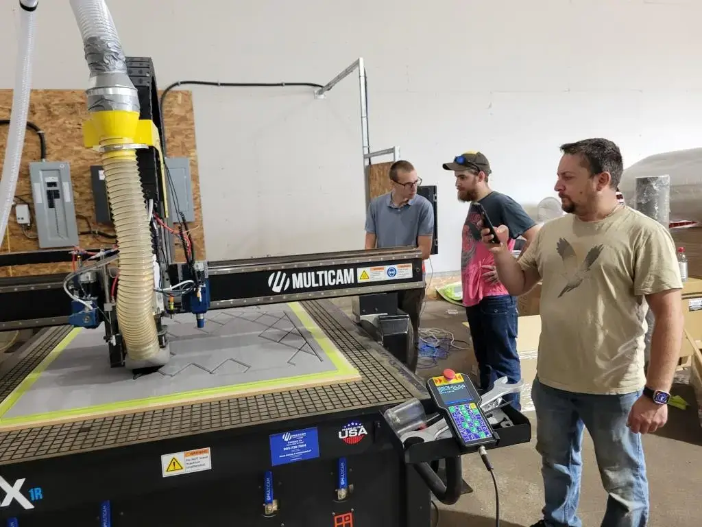 Installation of CNC machine router in East Coast Sport & Marine